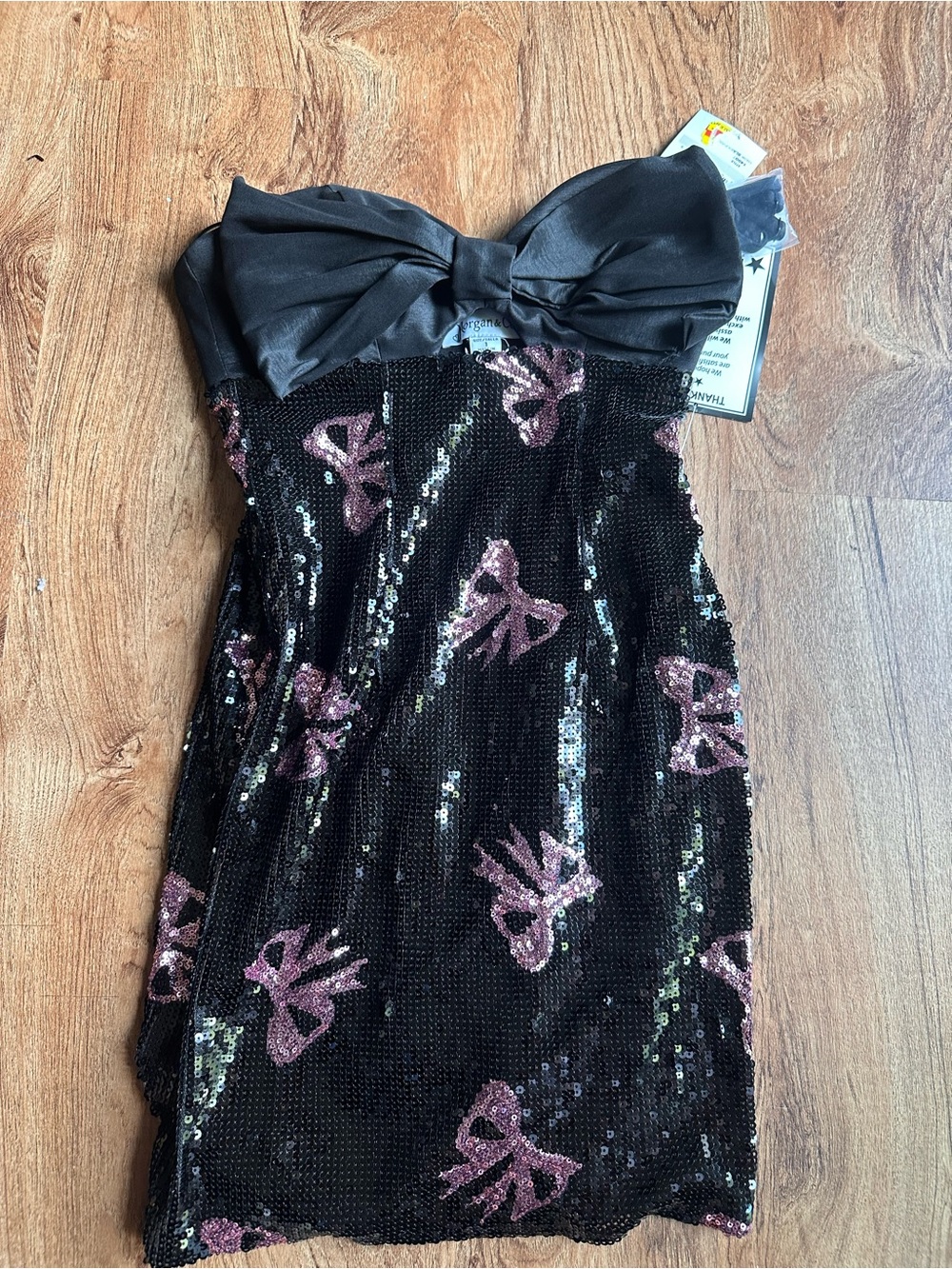 Morgan & Co. Black Sequin Strapless Dress with Pink Bow Motif